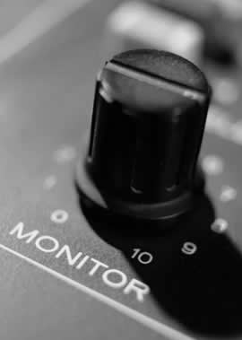 Mammoth Production live music booking agent, illustrated by knob on mixing console